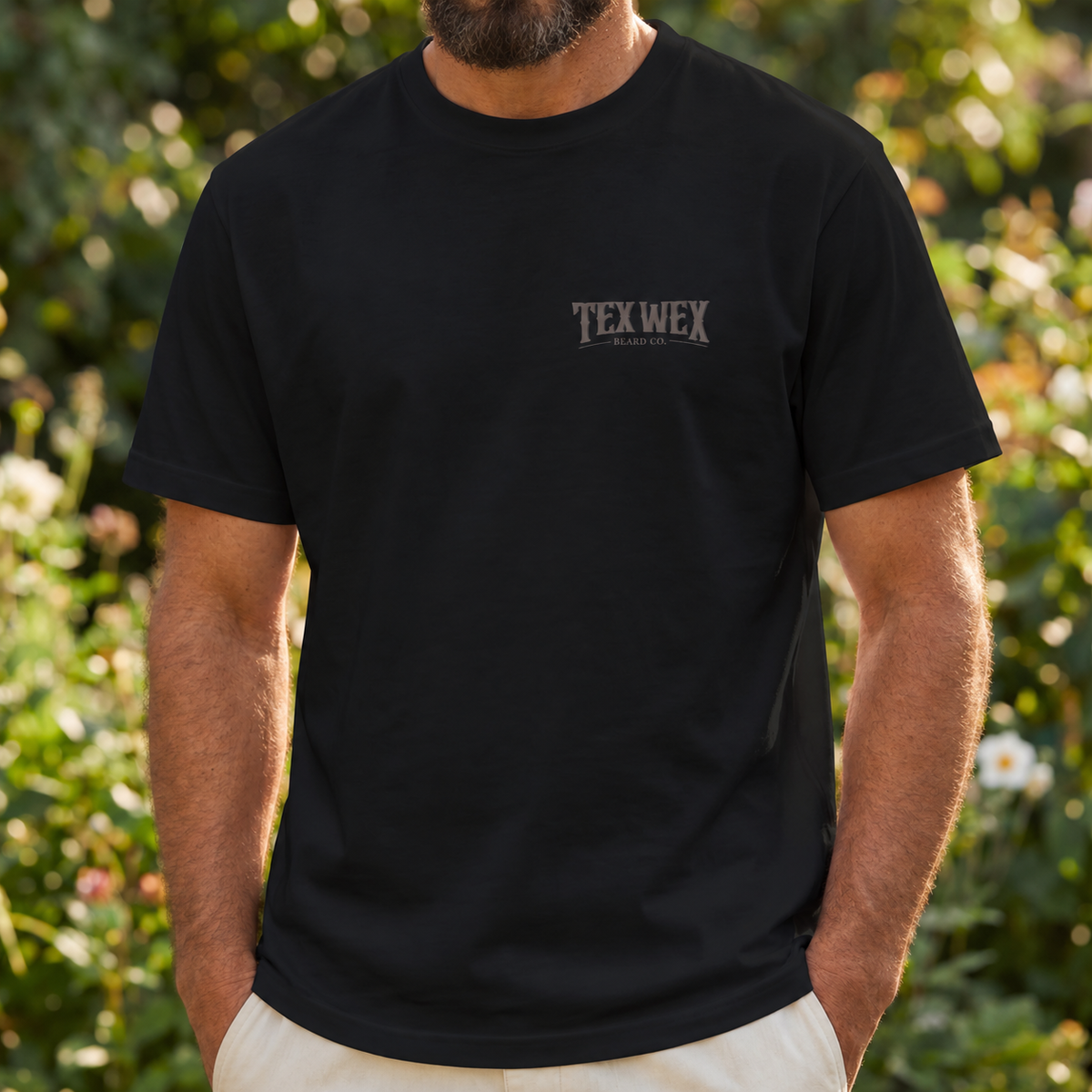 Tex Wex Beard Co. Nobody's Business Tee - front view, tonal chest logo on black